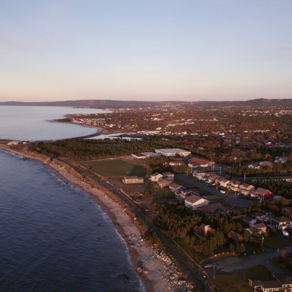 A drone view of the shoreline of Conception Bay South at dusk